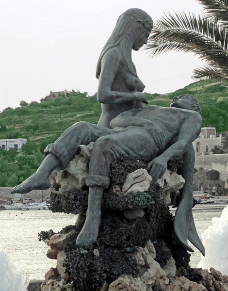Mermaid and Fisherman statue on Syros. Photo © by Christopher Zervas.