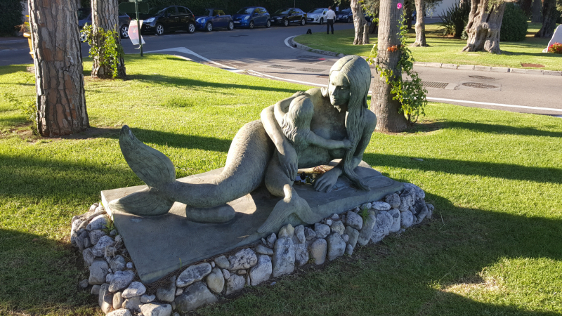Mermaid with Child in Beaulieu-sur-Mer by Natascha Jusopov. Photo © by Philip Jepsen.