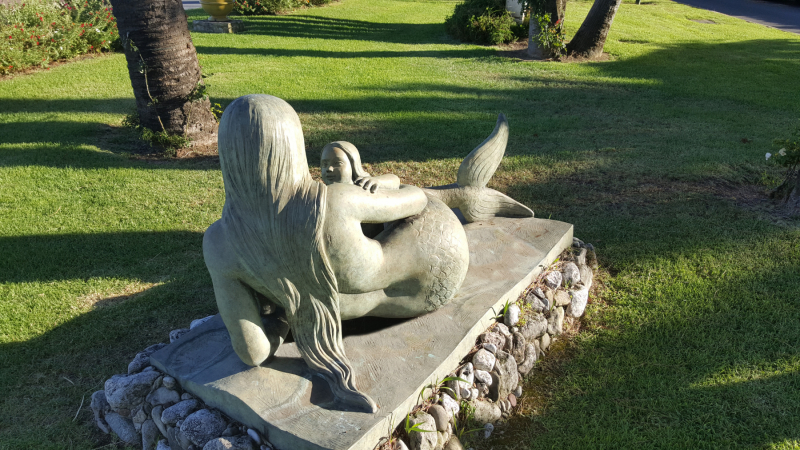 Mermaid with Child in Beaulieu-sur-Mer by Natascha Jusopov. Photo © by Philip Jepsen.