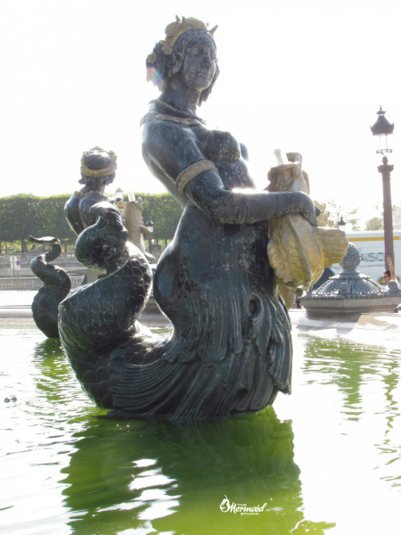 Mermaids in the fountain  at Place de la Concorde.  Photo © by Mica Moore.
