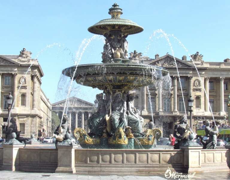 The Fountain at Place de la Concorde, with several mermaid statues.  Photo © by Mica Moore.