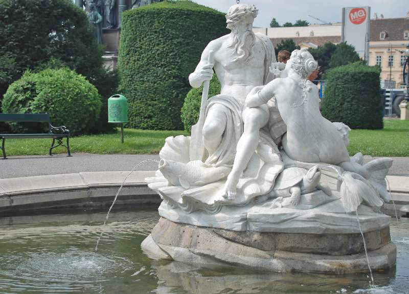 Mermaid and Triton in Maria Theresa Square. Photo by GuentherZ.