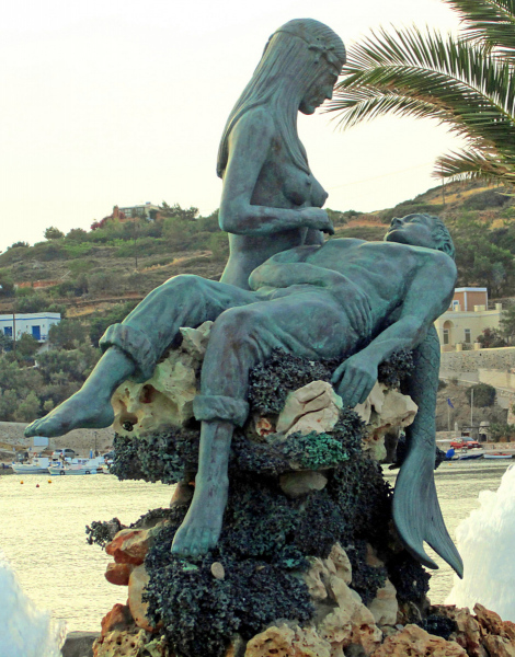 Mermaid and Fisherman statue on Syros. Photo © by Christopher Zervas.