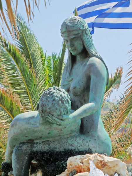 Mermaid and Fisherman statue on Syros. Photo © by Susan Hodgkins.