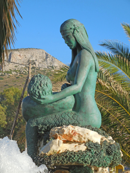 Mermaid and Fisherman statue on Syros. Photo © by Susan Hodgkins.