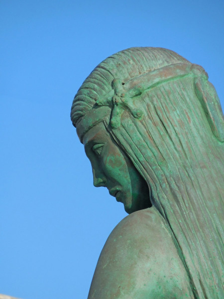 Mermaid and Fisherman statue on Syros. Photo © by Susan Hodgkins.