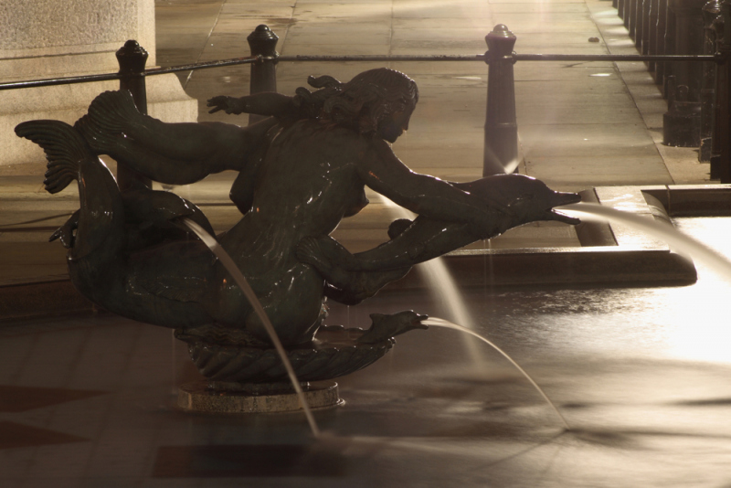 Trafalgar Square mermaid statue.  Photo © by Davide Simonetti.