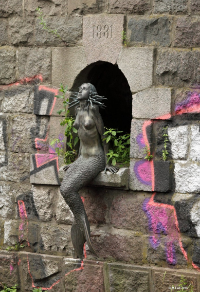 The Užupis Mermaid in Vilnius, Lithuania. Photo © by Marcin Fall.